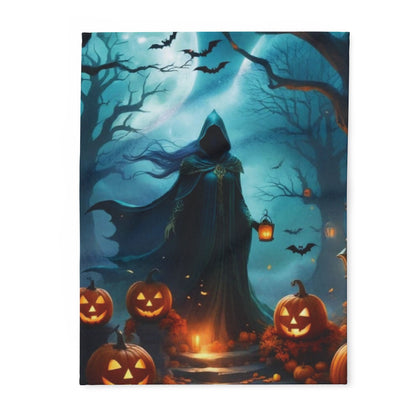 Decorative and Warm Halloween Spooky Arctic Fleece Blanket featuring a faceless figure in a flowing cloak holding a lantern surrounded by carved pumpkins under a moonlit sky, perfect for a luxurious Halloween atmosphere.