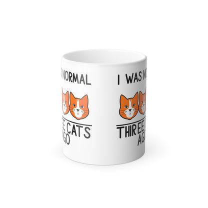 Elegant "I Was Normal 3 Cats Ago" Colour Morphing Mug showcasing playful cat illustrations, ideal for cat lovers seeking a luxurious addition to their morning routine.