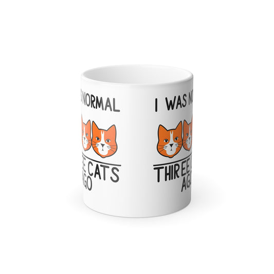 Elegant "I Was Normal 3 Cats Ago" Colour Morphing Mug showcasing playful cat illustrations, ideal for cat lovers seeking a luxurious addition to their morning routine.