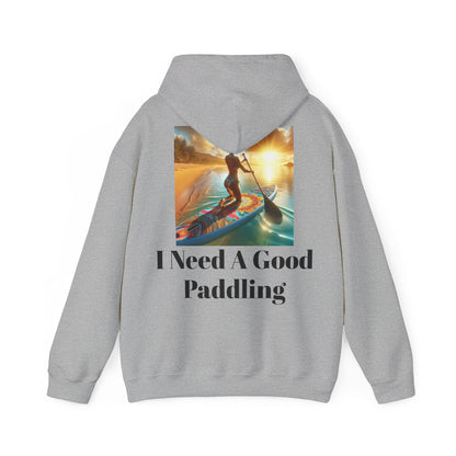 Fantasy Paddleboarding Unisex Hooded Sweatshirt in stylish grey with the phrase 'I Need A Good Paddling' alongside a picturesque paddleboarding sunset, perfect for adventure lovers.