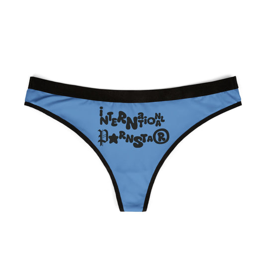 Luxury blue women's thong featuring a playful 'International Pornstar' graphic in bold black letters, designed for comfort and style.