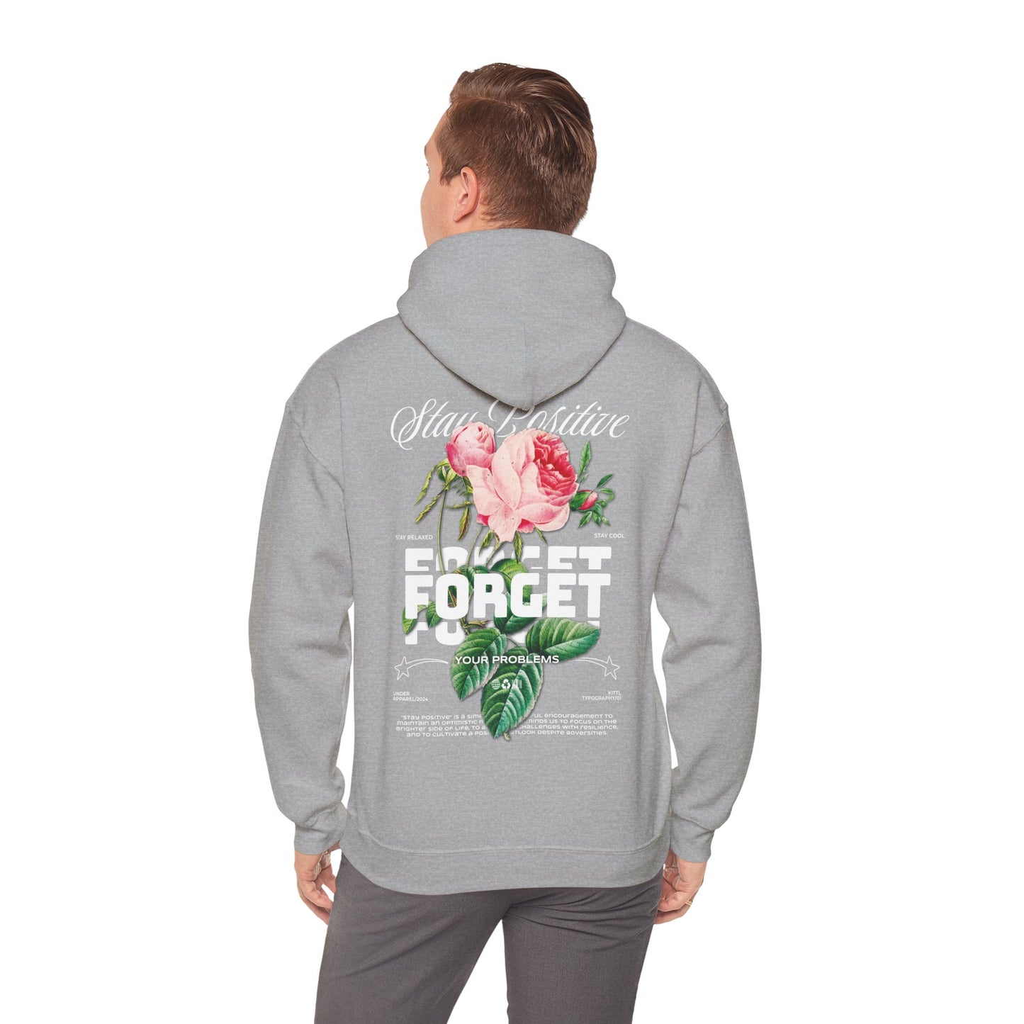 Elegant model wearing a grey hoodie, displaying the floral back print with inspiring phrases, perfect for a blend of comfort and style.