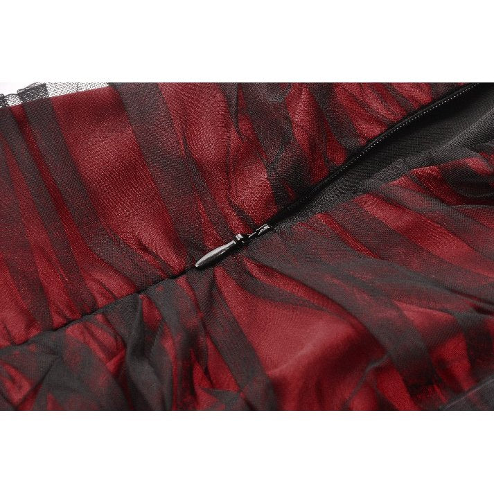 The Lilith Gothic Gown displayed elegantly on a mannequin emphasizing the floor-length design and dramatic movement of the mesh panels.