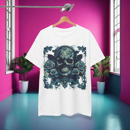 Skulls and Roses Cotton Tee displayed against a vibrant pink backdrop, showcasing an intricate steampunk skull and rose design for a bold and edgy aesthetic.
