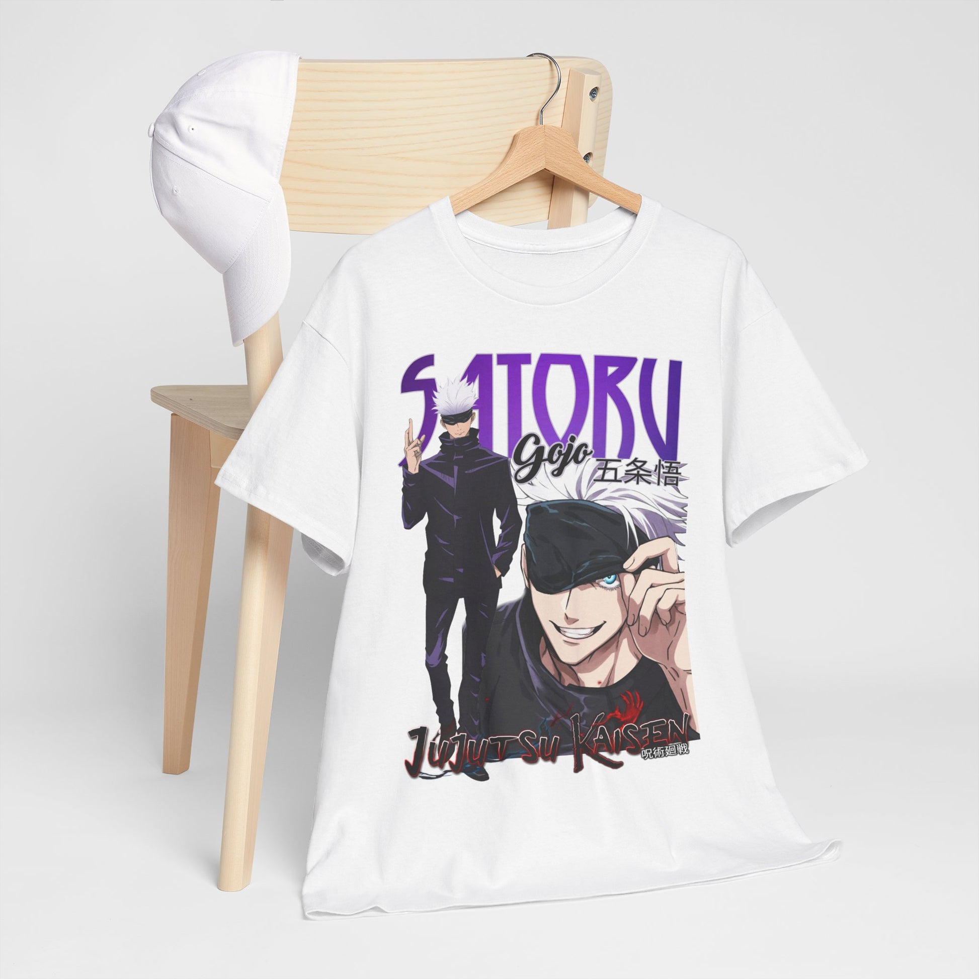 Chic Gojo Satoru T-shirt styled with a cap, hanging on a wooden chair, ideal for casual wear and showcasing anime-inspired fashion elegance.