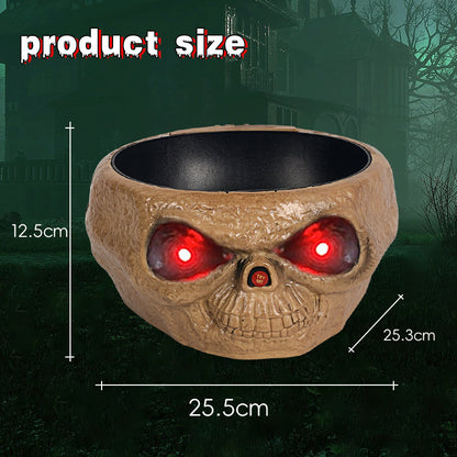 Halloween Candy Bowl With Motion Activated Skeleton Hand highlighting a skull-shaped bowl with sinister red eyes, great for adding a haunting touch to your decor.