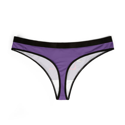 Sophisticated purple thong panty with striking pink 'Good Girl' lettering and a golden halo detail, combining comfort with a chic aesthetic.