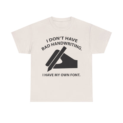 I DON'T HAVE BAD HANDWRITING humorous graphic unisex T-shirt in cream, featuring a playful design with the phrase 'I DON'T HAVE BAD HANDWRITING. I HAVE MY OWN FONT.' on a soft, luxurious fabric.