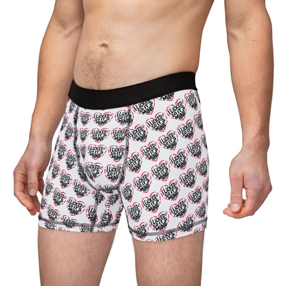 Man wearing Valentine's Naughty Cheeky Men's Boxer Briefs, showcasing a confident fit and stylish design, ideal for adding fun to romantic moments.