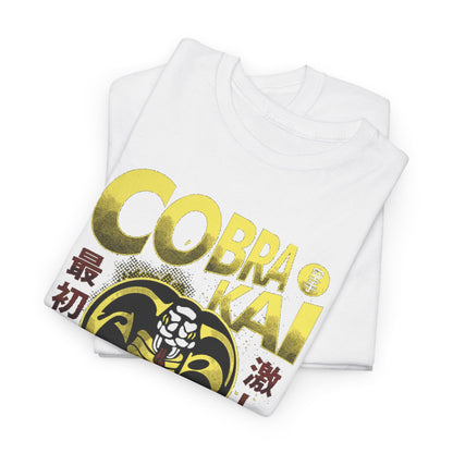 Luxurious folded white t-shirt adorned with a distinctive Cobra Kai graphic of a snake, blending sophistication with a bold martial arts theme.