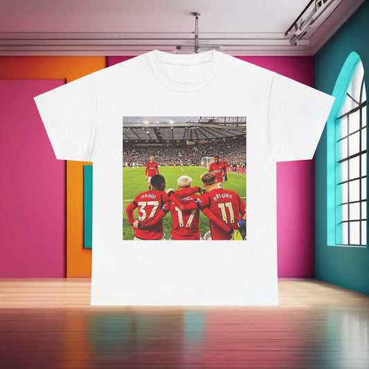 Luxurious white Manchester United Mainoo Garnacho Hojlund T-Shirt displayed in a chic, vibrant environment, highlighting the iconic football tribute for dedicated supporters.