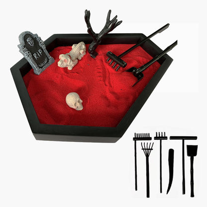 Halloween Sand Table Decoration Micro Landscape Sandbox Crafts featuring red sand, spooky decorations including an 'RIP' tombstone, skull, animal skeleton, and miniature tools for creativity.