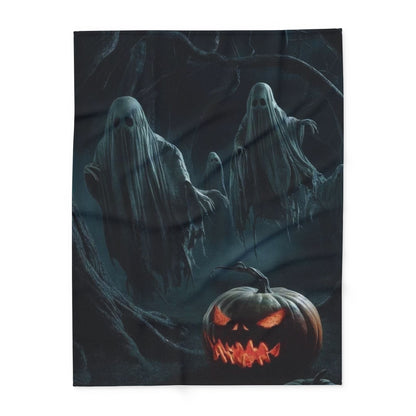 Luxurious Decorative and Warm Halloween Spooky Arctic Fleece Blanket showcasing ethereal spirits and a carved pumpkin, ideal for a sophisticated Halloween atmosphere.