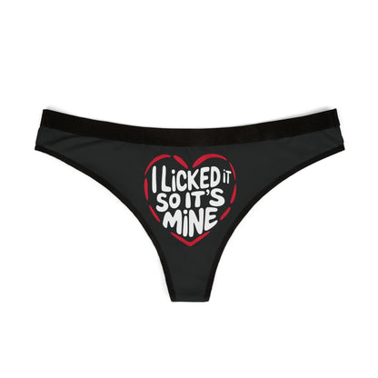 Valentine's Naughty Gift Cheeky Women's Thong featuring 'I Licked It So It's Mine' slogan, designed for a playful and romantic occasion. Elegant black fabric with a striking red heart graphic, perfect for birthdays, anniversaries, or Valentine's Day.