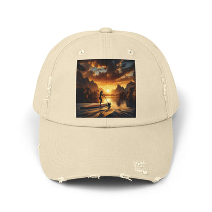 Unisex Distressed Paddleboarders Cap displayed in a sandy beige hue, featuring a vibrant paddleboarding sunset graphic, ideal for fashionable outdoor enthusiasts.