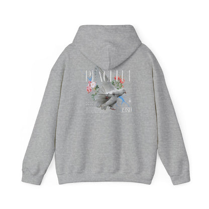 Chic grey hoodie with an intricate back print of doves and florals, symbolising tranquillity and refined style.