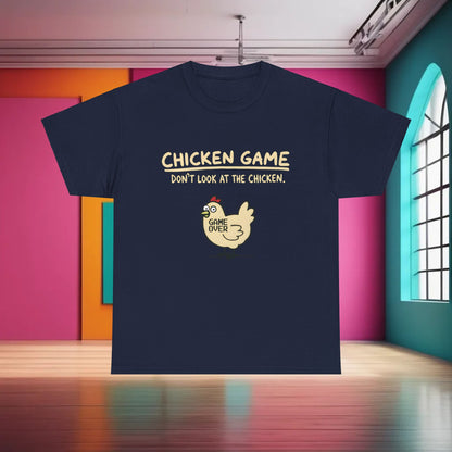 Urban Chicken Game Graphic T-Shirt presented against a vibrant interior, showcasing the playful text 'CHICKEN GAME DON'T LOOK AT THE CHICKEN', a whimsical piece that elevates contemporary luxury fashion.