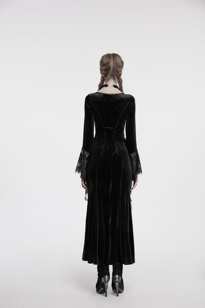 Elegant display of the Punk Rave Isolde Black Velvet Lace Sleeve Dress styled with gothic accessories, perfect for alternative fashion enthusiasts.