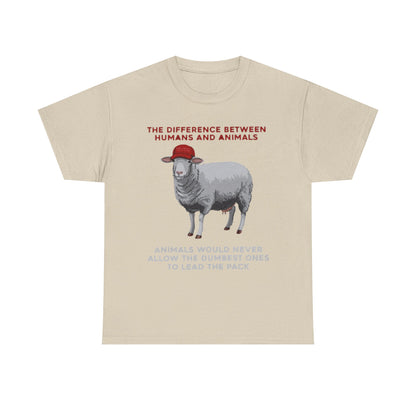 Refined unisex T-shirt in a soft beige tone, featuring a witty political satire design that illustrates a sheep in a red cap with the phrase 'THE DIFFERENCE BETWEEN HUMANS AND ANIMALS' and 'ANIMALS WOULD NEVER ALLOW THE DUMBEST ONES TO LEAD THE PACK', perfect for making a bold statement.