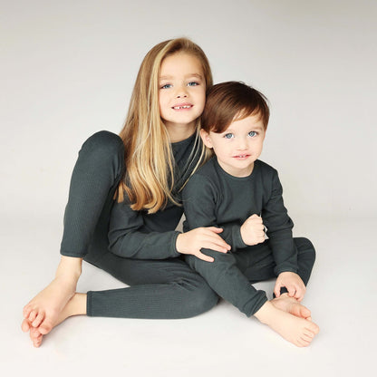 DreamBuy Pine Family Matching PJs featuring classic pullover design with elastic waist, a sophisticated addition to family sleepwear collections.
