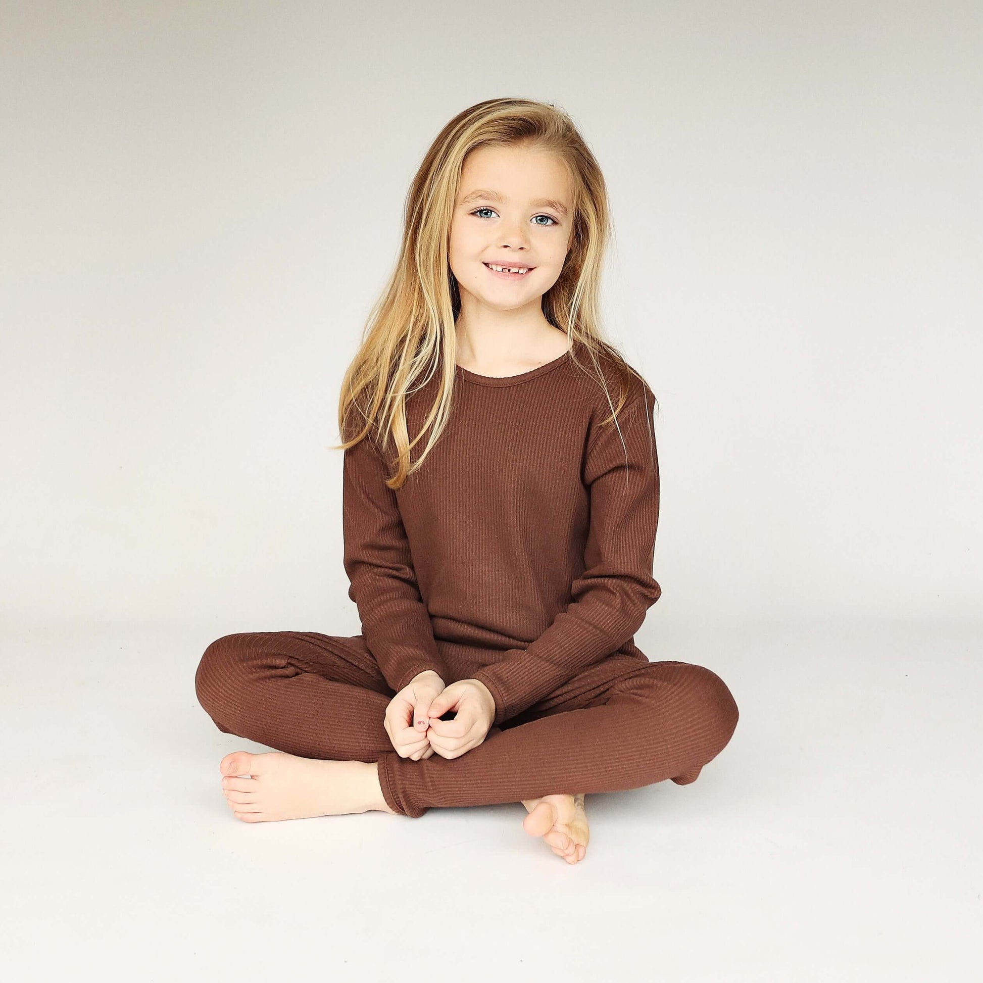 High-quality, machine washable chocolate family pajamas by DreamBuy, combining classic design with modern comfort for a sophisticated night's sleep.