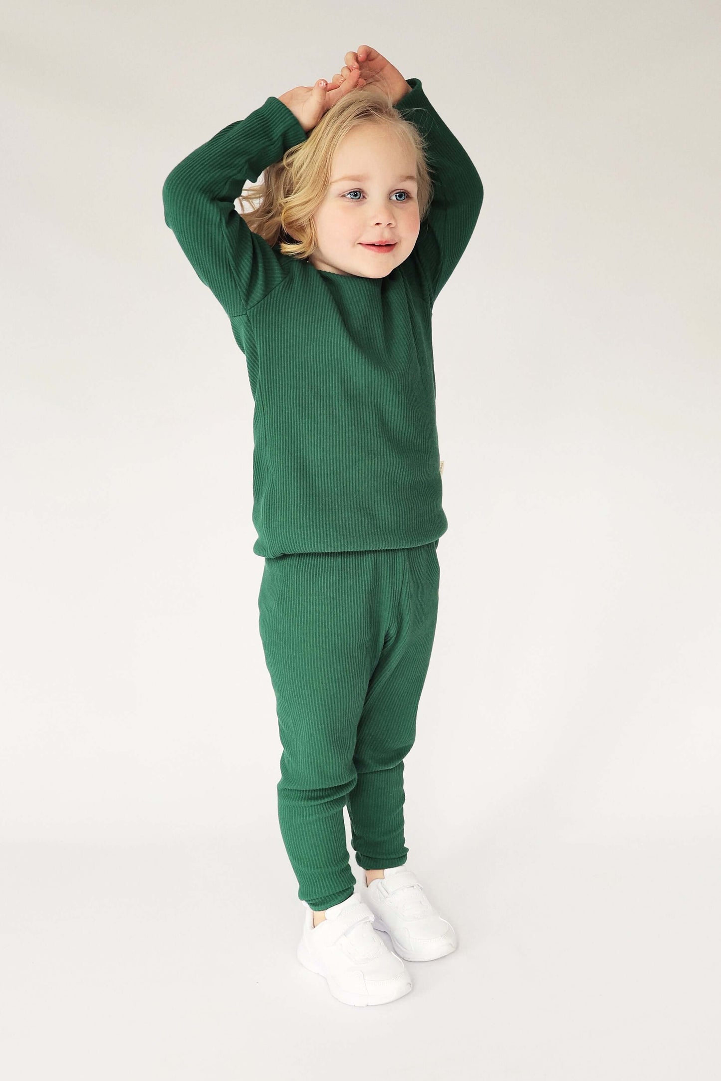 Luxury family matching pyjamas in forest green by DreamBuy, made from soft cotton blend, showcasing sizes for everyone from 3 months to XXL.