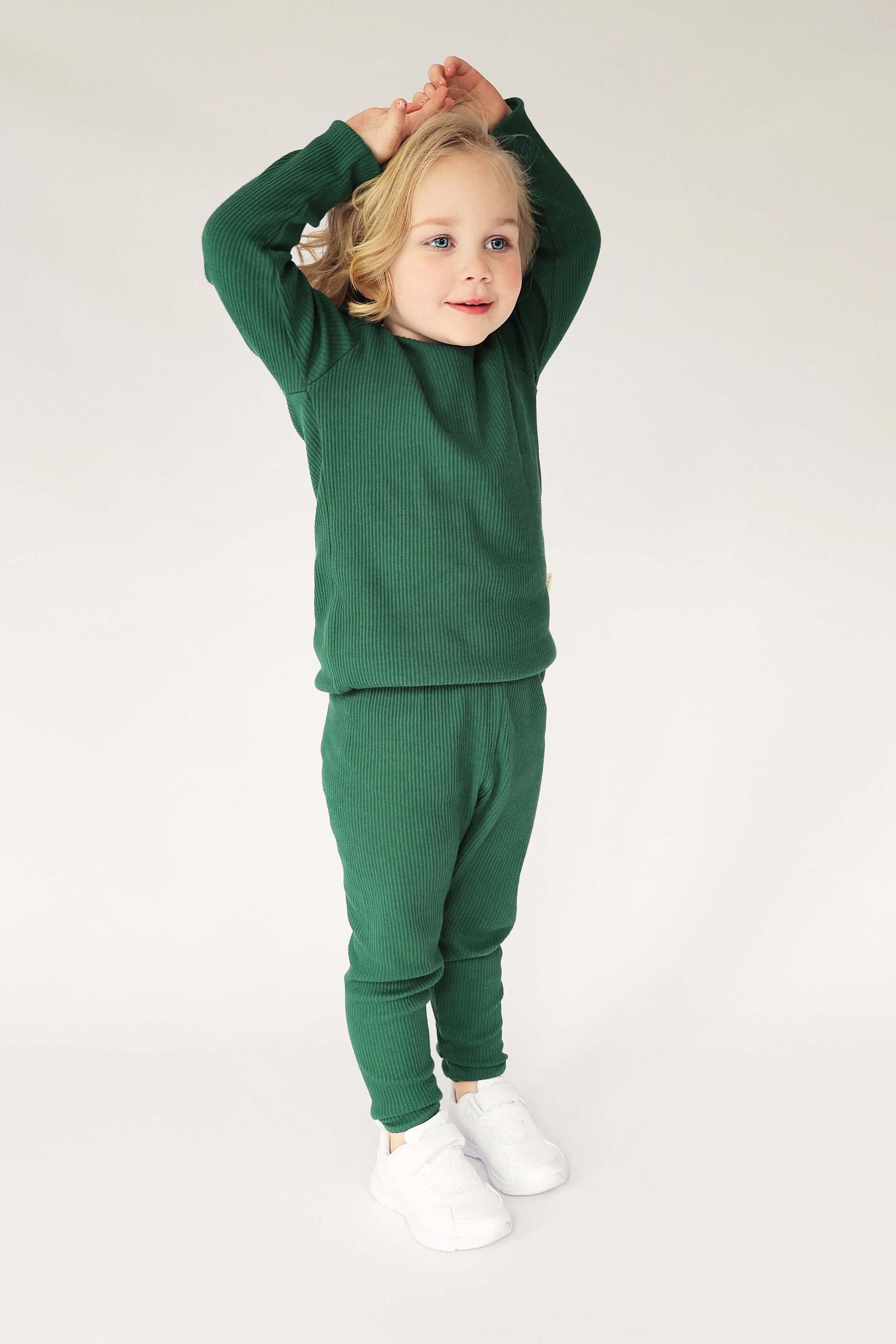 Luxury family matching pyjamas in forest green by DreamBuy, made from soft cotton blend, showcasing sizes for everyone from 3 months to XXL.