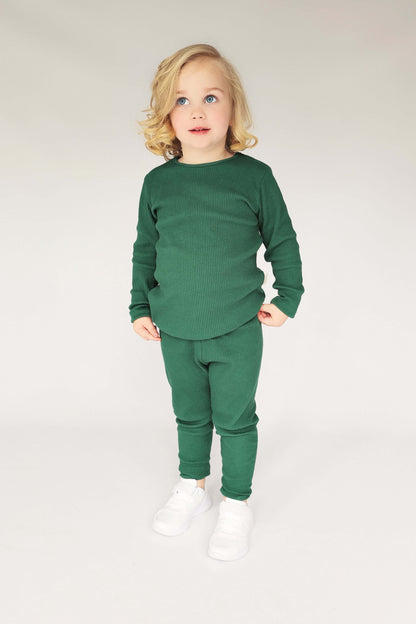 Cozy and stylish forest green family pyjamas by DreamBuy, perfect for Christmas celebrations, made with breathable and lightweight fabric.