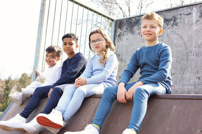 Chic and comfortable DreamBuy matching Christmas pyjamas for family, featuring a simple design and drawstring pants, ideal for play and relaxation.