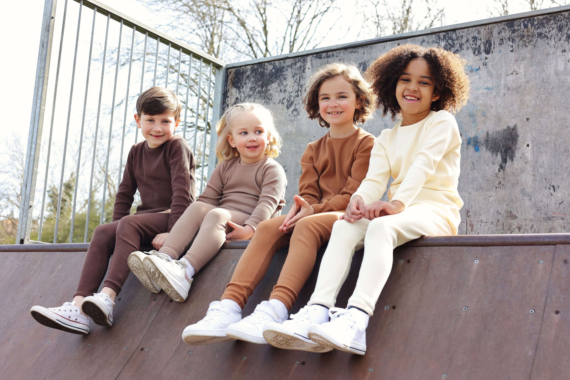 Versatile DreamBuy Christmas pyjamas presented as loungewear for the whole family, perfect for festive playing and relaxing in style.