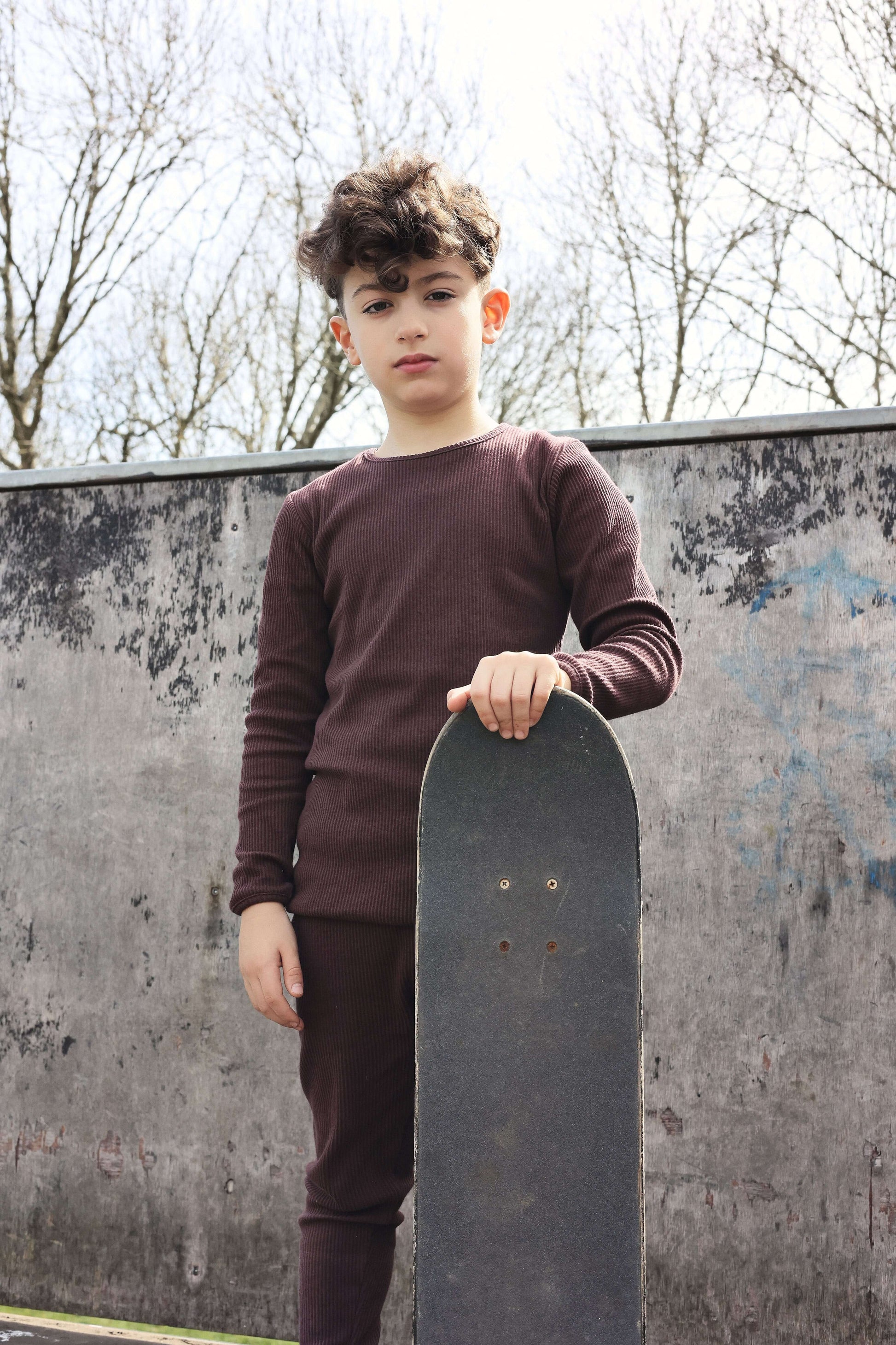 Luxuriously soft family matching pyjamas in aubergine by DreamBuy, designed for ultimate comfort and chic style, available for sizes from 3 months to XXL.