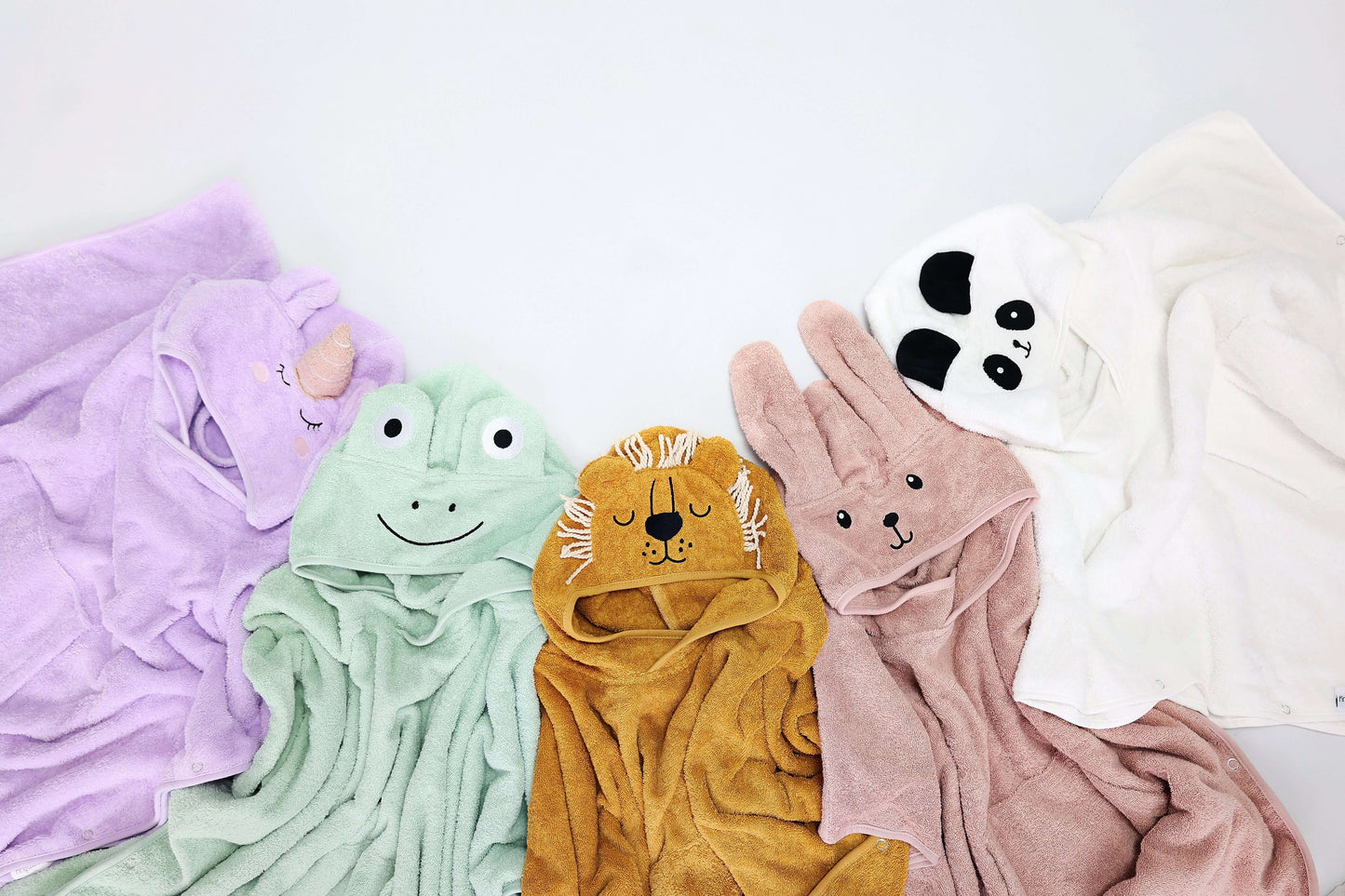 Colourful Frog Design hooded towel poncho by DreamBuy, a chic and practical option for children, machine washable and soft.