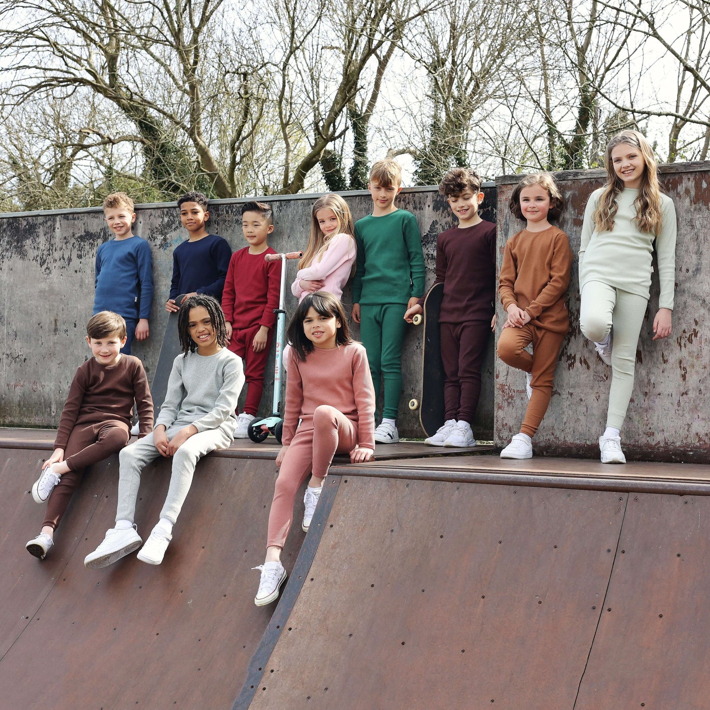 Stylish minimalist design of DreamBuy's Christmas pyjamas set, showcasing a long-sleeved blouse and drawstring pants in luxurious leather pink.