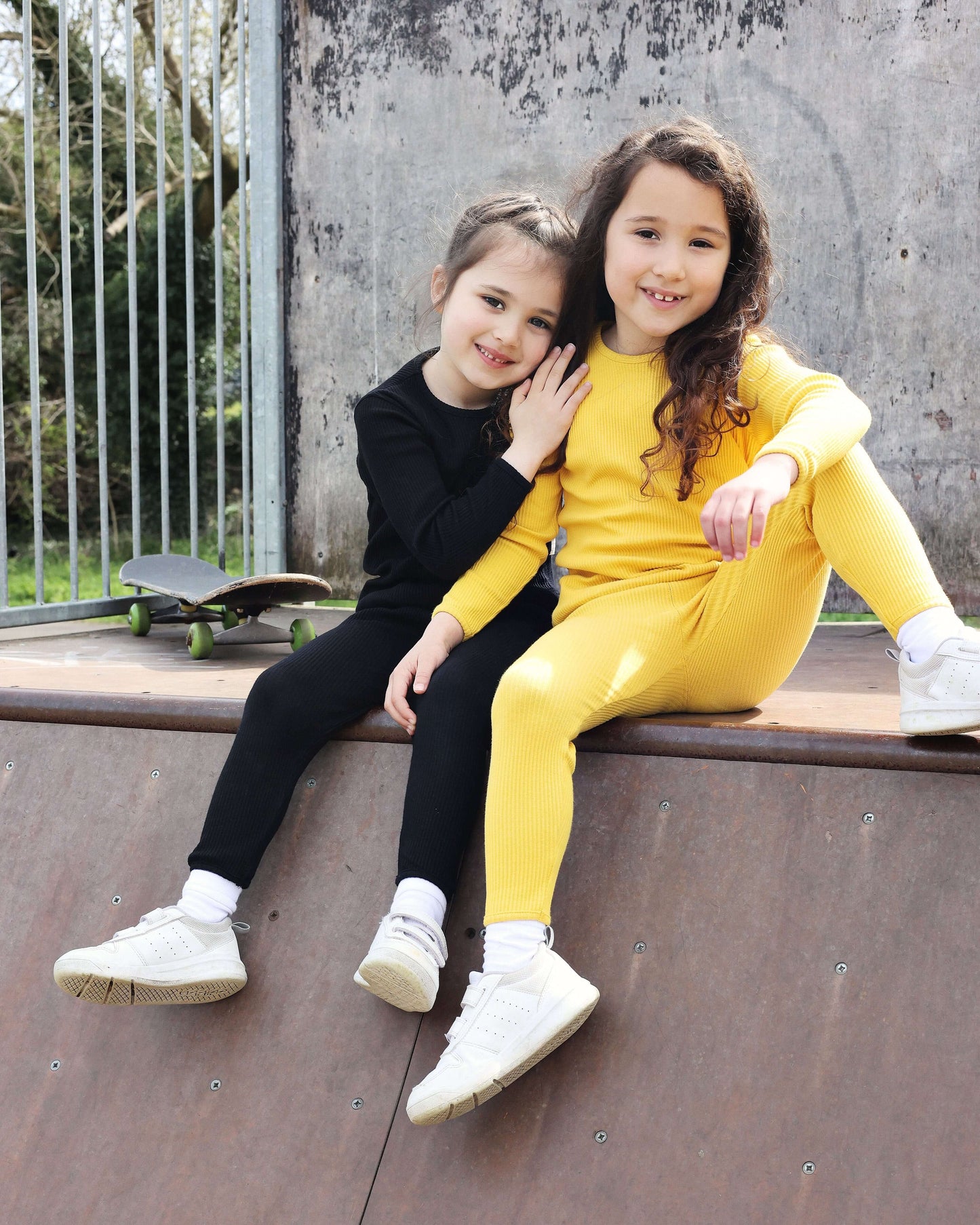 Luxury black matching family pajamas from DreamBuy, crafted from soft, breathable cotton, perfect for all ages from newborn to adult XXL, featuring comfort and style for cozy family nights.