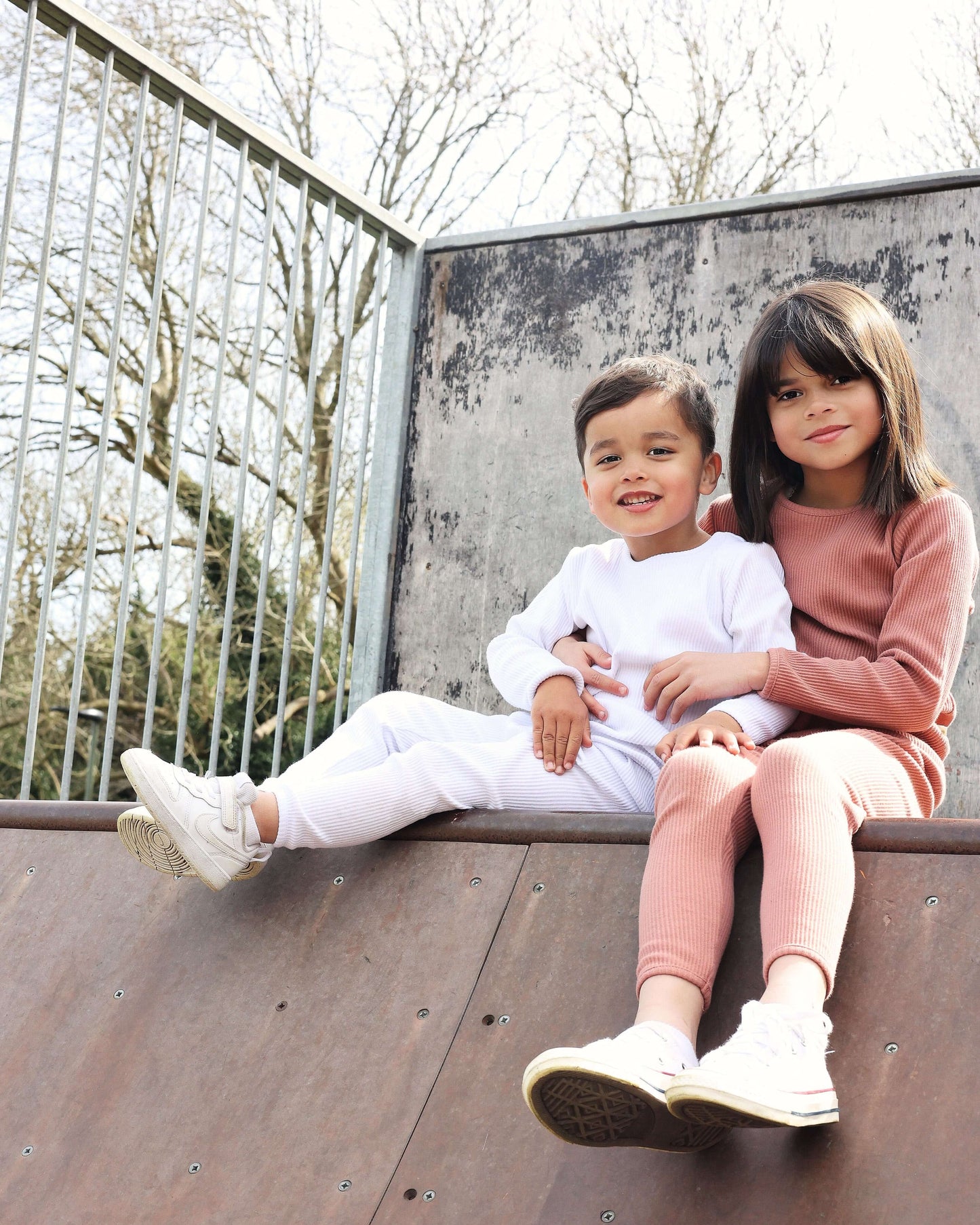 Luxury ribbed family Christmas pyjamas set in leather pink by DreamBuy, featuring matching outfits for the whole family from 3 months to XXL.