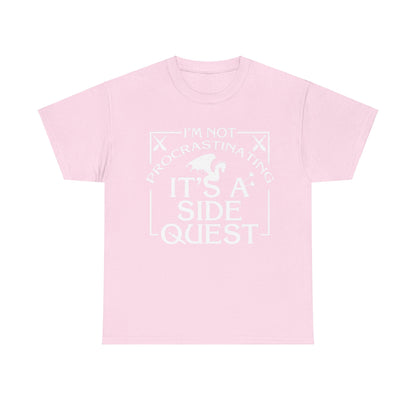 Luxury Unisex Graphic Tee: "It's A Side Quest" in a gentle pink hue, featuring an eye-catching white print stating 'I'M NOT PROCRASTINATING, IT'S A SIDE QUEST' adorned with fantasy-themed design elements.