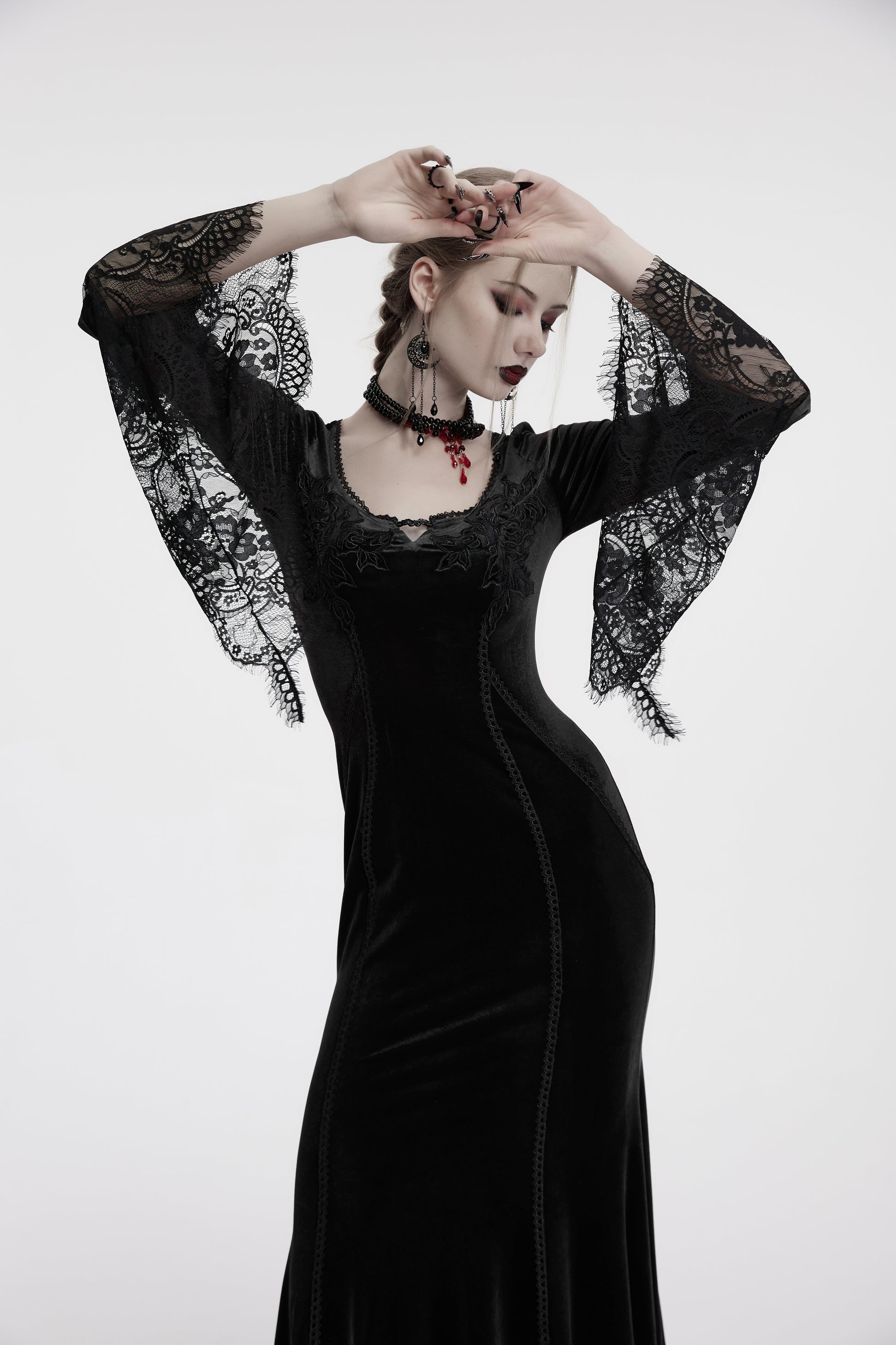 Punk Rave Isolde Black Velvet Dress showcasing intricate rose embroidery at the neckline, highlighting gothic elegance.