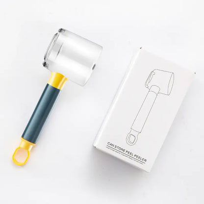 Sophisticated shot of a vegetable peeler with its packaging, illustrating a modern design that complements any upscale kitchen décor.