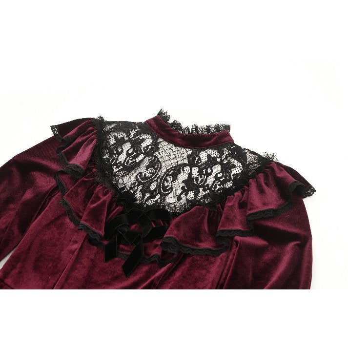 Luxurious burgundy velvet dress with black gothic lace detailing and playful ruffle neckline, perfect for elegant evenings out.