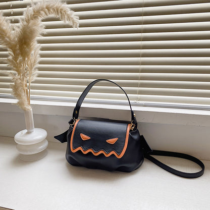 Sophisticated Versatile PU Crossbody Bag for Women in sleek black featuring a whimsical pumpkin motif, ideal for Halloween festivities and fashionable outings.
