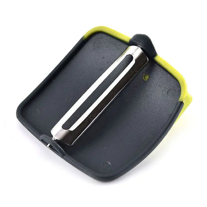 Elegant stainless steel fruit and vegetable peeler with a modern ergonomic handle, showcasing its sleek design for effortless kitchen operation.