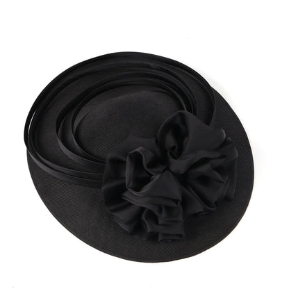 Chic polyester sinamay fascinator hat featuring intricate detailing, a must-have accessory for any fashionable event throughout the year.