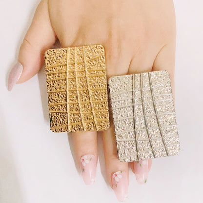 Stylish women's gold plated rings set showcasing unique shapes, crafted for the discerning fashion enthusiast.