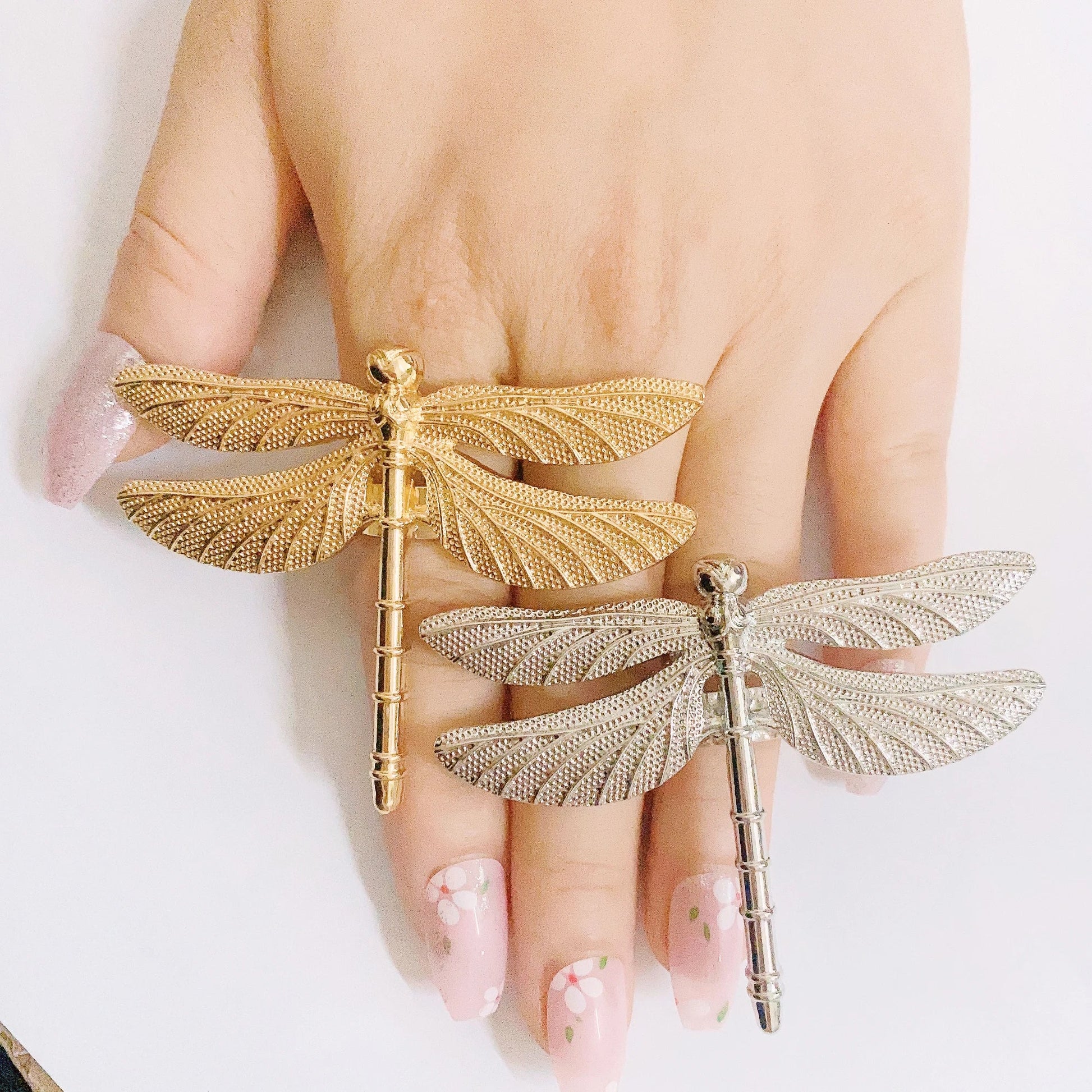 Luxurious collection of assorted shape gold rings for women, adjustable to fit any finger size, perfect for an elegant look.