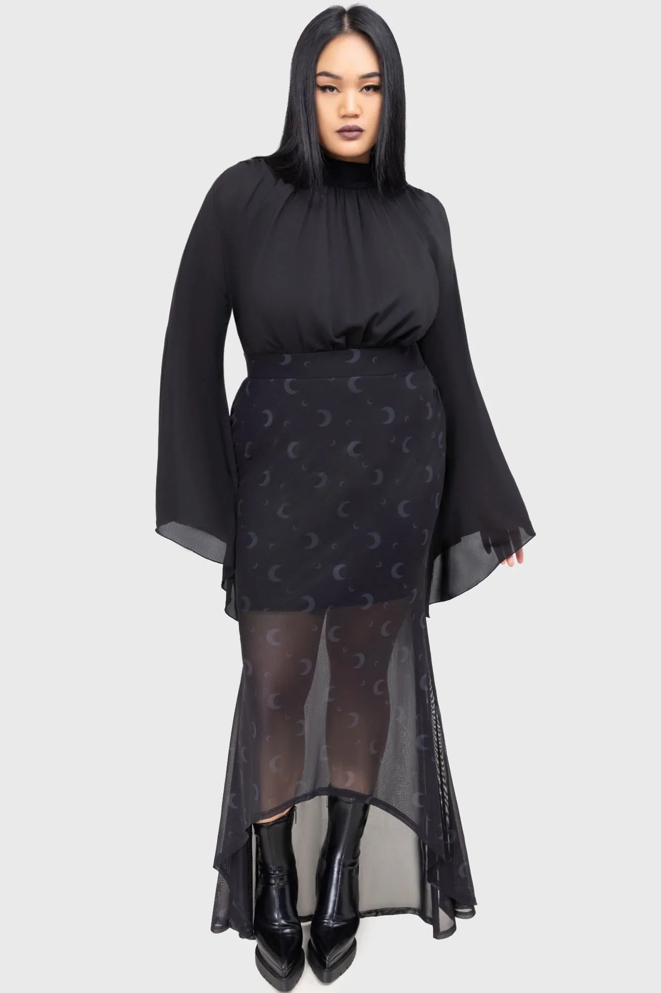 Flat lay of the Killstar Astralune Flared Sleeve Top styled with accessories, showcasing its versatile elegance for modern gothic and alternative wardrobes.