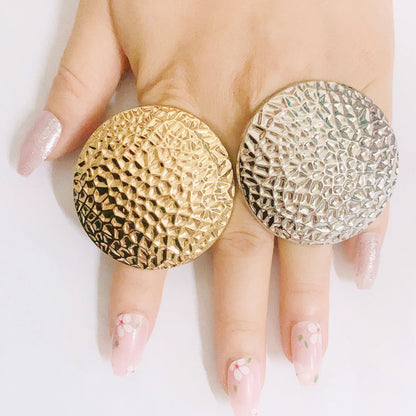 Set of elegant gold rings designed for women, featuring intricate shapes that elevate modern jewellery aesthetics.