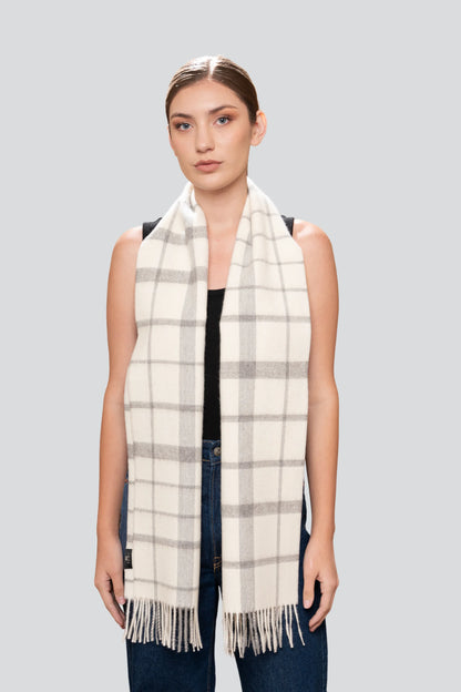Stylish alpaca scarf with subtle plaid pattern, a must-have accessory for natural luxury and winter elegance.