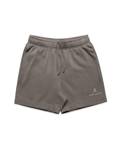 Luxury relaxed fit script faded sweat shorts by Anchor and Rose Apparel featuring an elasticated waistband and stylish side pockets.