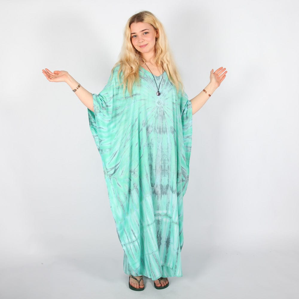 Luxury full-length tie dye kaftan dress in deep navy blue and fresh mint green, featuring dramatic sunburst design, perfect elegant beach cover-up and versatile summer outfit for UK sizes 8-16.