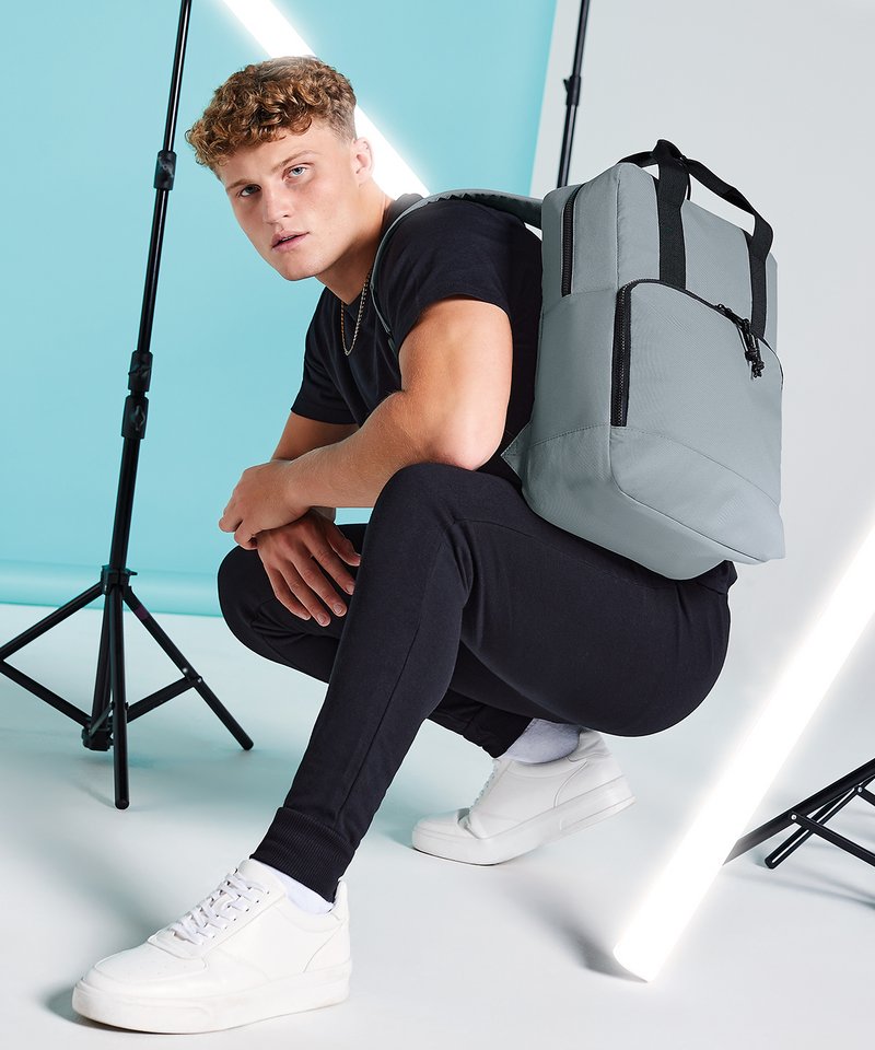 Luxurious eco-friendly recycled twin handle insulated cooler backpack featuring adjustable padded straps and reflective detailing.